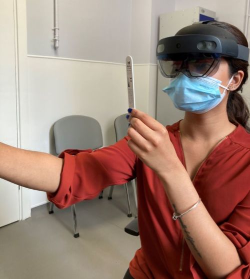 Clinician wearing hololens headset